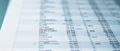 Simple spreadsheet open on a laptop (corrected)
